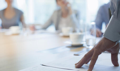 hand on conference table over plans - design advantage gcp0170 Thumbnail